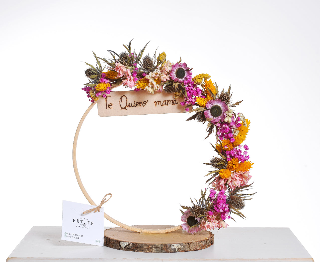 Corona floral colorida con mensaje personalizado